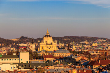 Fototapeta na wymiar Aerial view of St. George's Cathedral and old town of Lviv in Ukraine. Lvov cityscape. View from bell tower of Church of Sts. Olha and Elizabeth