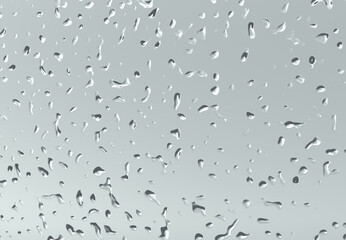 Water drops on transparent glass. Raindrops on a window against