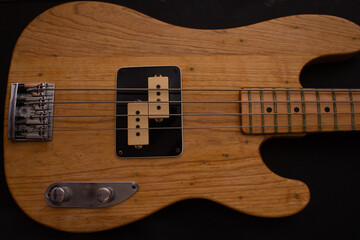 Close-up of a wooden 70's bass