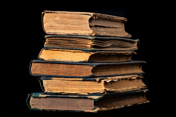 A stack of old books. Paper publications from the old library.