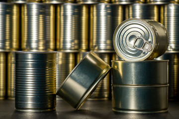 Metal cans with preserved meat. Food with a long shelf life.