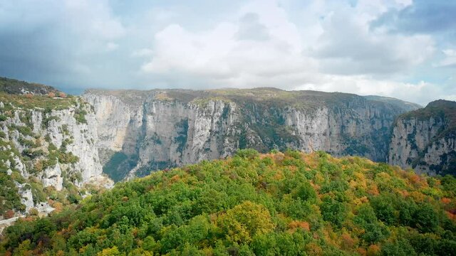 Beautiful landscape, aerial forward motion view on the deep rocky Vikos canyon in northern Greece