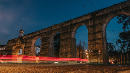 Obraz premium ancient roman bridge at night 