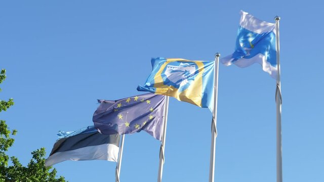 Saaremaa.Estonia-July 5.2020: Saaremaa.Estonia-July 5.2020: The flags on the poles in Kuressaare Estonia with the European Union flag on it 