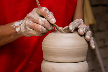Ceramics on the elaboration process at a traditional factory at the small city of Raquira in Colombia