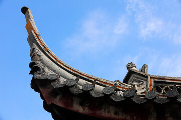 The sculpture on the roof ridge is in Chenxiang Pavilion, Shanghai, China