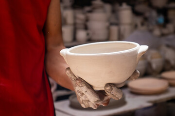 Ceramics on the elaboration process at a traditional factory at the small city of Raquira in Colombia