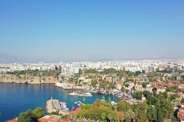 Fototapeta na wymiar Yacht marina. The beautiful View of the city, yachts and marina in Antalya. Antalya is popular tourist destination in Turkey is a district on the Mediterranean coast. Aerial view
