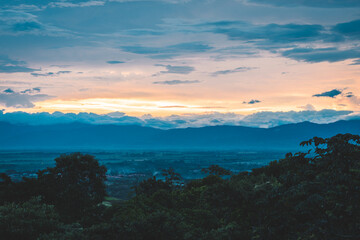 sunset in the mountains and the valley 