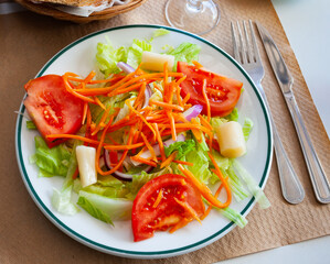 Close up of Spanish vegeterian salad on white plate