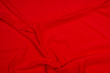 Fleece fabric red top view. Texture of textile fleece bedspread.	