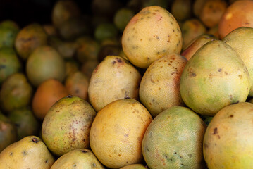 Fresh from the farm pomelos on sale in a public market