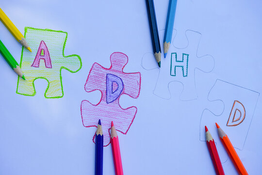 Kid's hand writing ADHD (Attention deficit hyperactivity disorder) Drawing is play therapy for ADHD child.