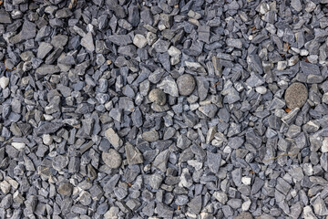 Stones texture and background. Rock texture . Crushed gravel background. Seamless texture of gravel...