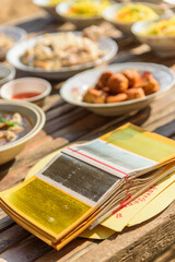 silver and gold paper / joss paper in make offerings to the spirits in Chinese new year festival