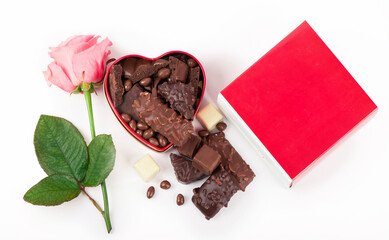 rose and dark chocolate for valentine day on isolate white background.