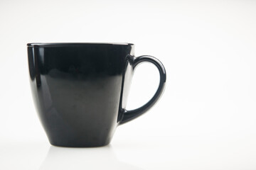 single black cup on white background. Copy space