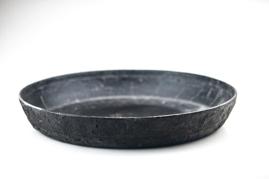 Old Cast Iron Frying Pan On White Background