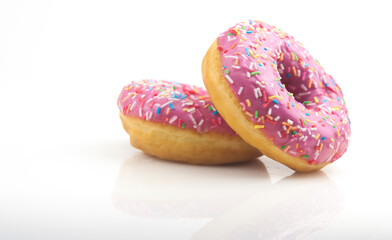 Two pink donuts on a white background