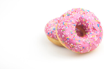 Two pink donuts on a white background