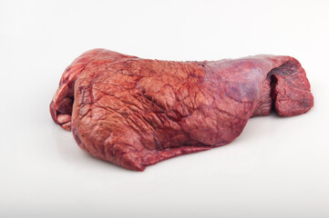 Raw beef lungs on white backgroundю Top view