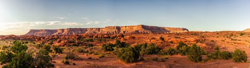 Panorama shot of orange massif of rock in american desert near canyonlands at sunny day in Utah