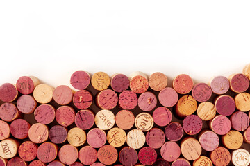 Wine corks background, a design template for a restaurant menu or winery brochure, shot from the top with a place for text, on a white background