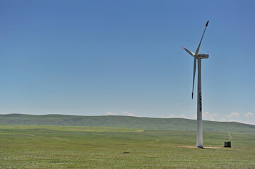 Zhambyl region, Kazakhstan - 05.15.2013 : Wind turbines located in an open hilly area to collect energy.