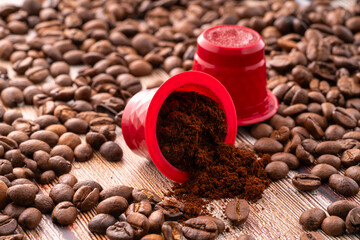 coffee capsules with ground coffee and coffee beans, coffee background