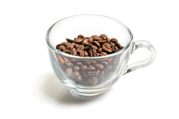 roasted coffee beans in a glass cup isolated on a white background