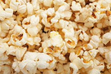 Heap of delicious popcorn as background