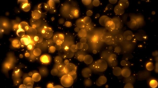 浮遊する大きな金色のパーティクル火花素材