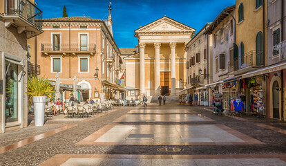 Bardolino on Garda lake. Street of the famous picturesque Village. The town is a popular holiday destination. Bardolino, Verona province, northern Italy - october 29, 2020