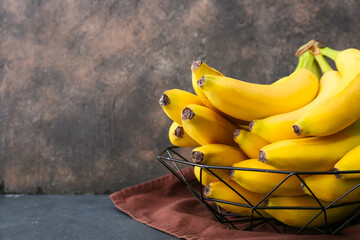 Tasty bananas on dark background