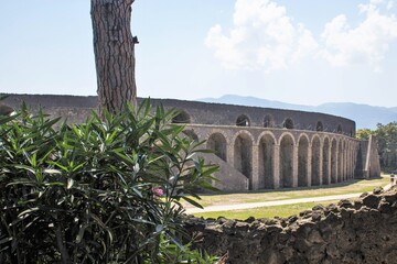 Pompeii, Italy, June 26, 2020 external walls of the Roman amphitheater where the Pompeians watched...