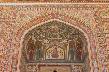 Intricate carvings and mosaics on the walls and ceilings, Sheesh Mahal, Jaipur, Rajasthan, India.