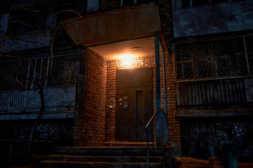 Fototapeta na wymiar gloomy Russian entrance, at night. lonely intercom