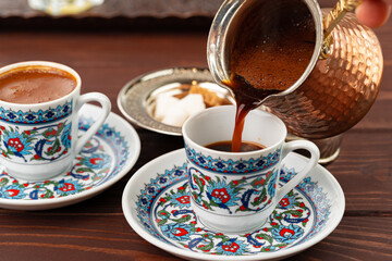 Traditional turkish coffee in oriental dishware close up - Powered by Adobe