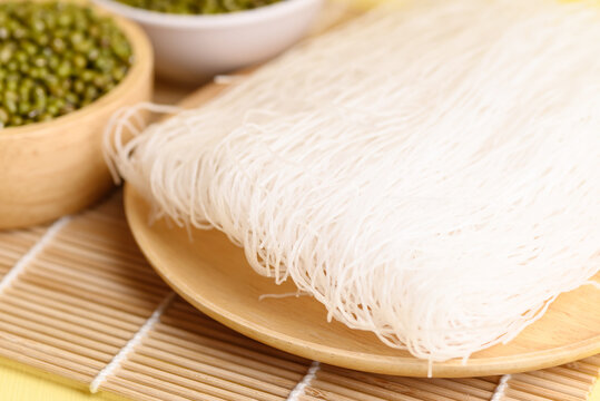 Dry glass noodles or cellophane noodles made from mung bean starch, Food ingredients in Asian food such as soup, stir fried, salad and hot pot