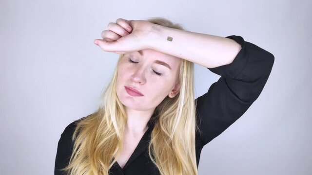 The woman shows his hand with a chip implanted. The concept of chipping and implantation of electronic technologies into the human body. Cybernetics and the nanofuture. Cyberpunk