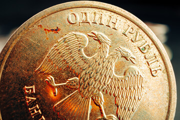 Russian rouble coin on dark background close up