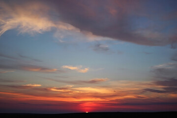 Beautiful sunset with clouds. Travel concept. Copy space for text.