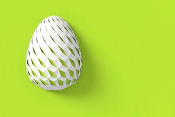 Easter concept. One single white egg with geometric original carved changing patterns on the surface on a green background. 3d illustration