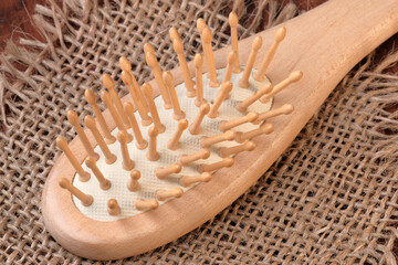 Wooden massage comb close up