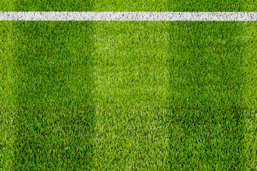 Top view of the white Line marking on the artificial green grass soccer field.