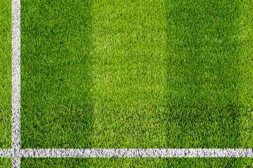Top view of the white Line marking on the artificial green grass soccer field.