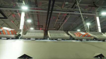 Sorting mail parcels at the factory. Special equipment. Postal packages and boxes