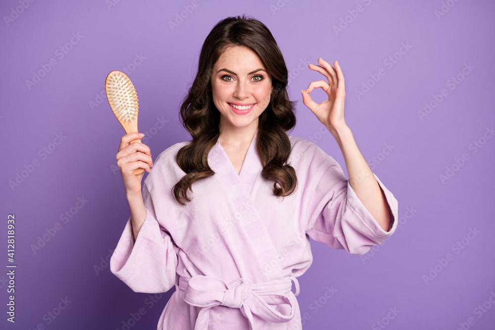 Poster photo of young woman hold brush show okey sign choice choose recommend promo hair therapy isolated o