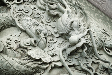 Chinese style dragon statue and cloud.  
