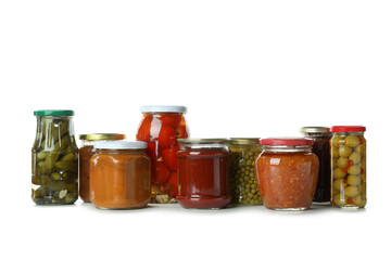 Jars with different canned food isolated on white background